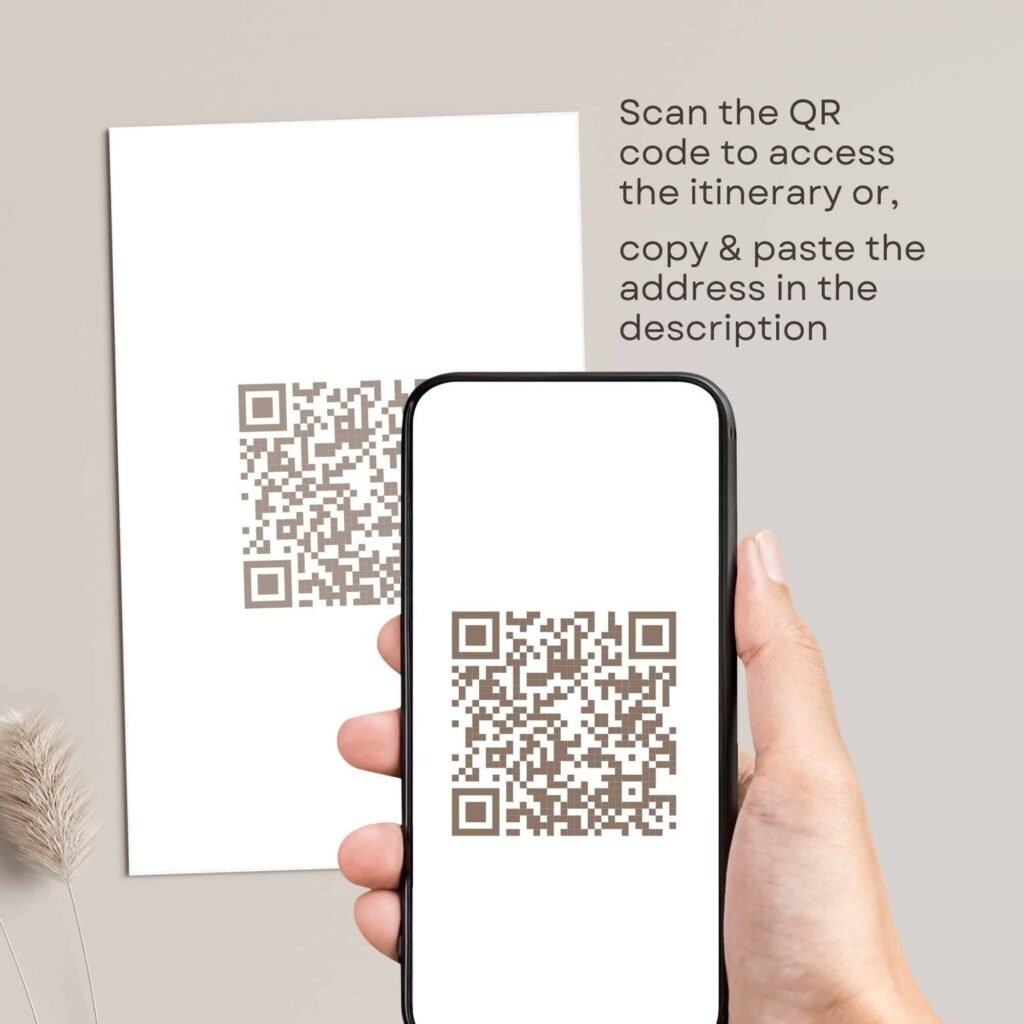 Hand holding phone scanning QR code